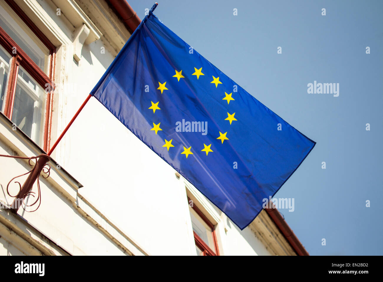 Blue with yellow stars european union flag hanging from building Stock ...