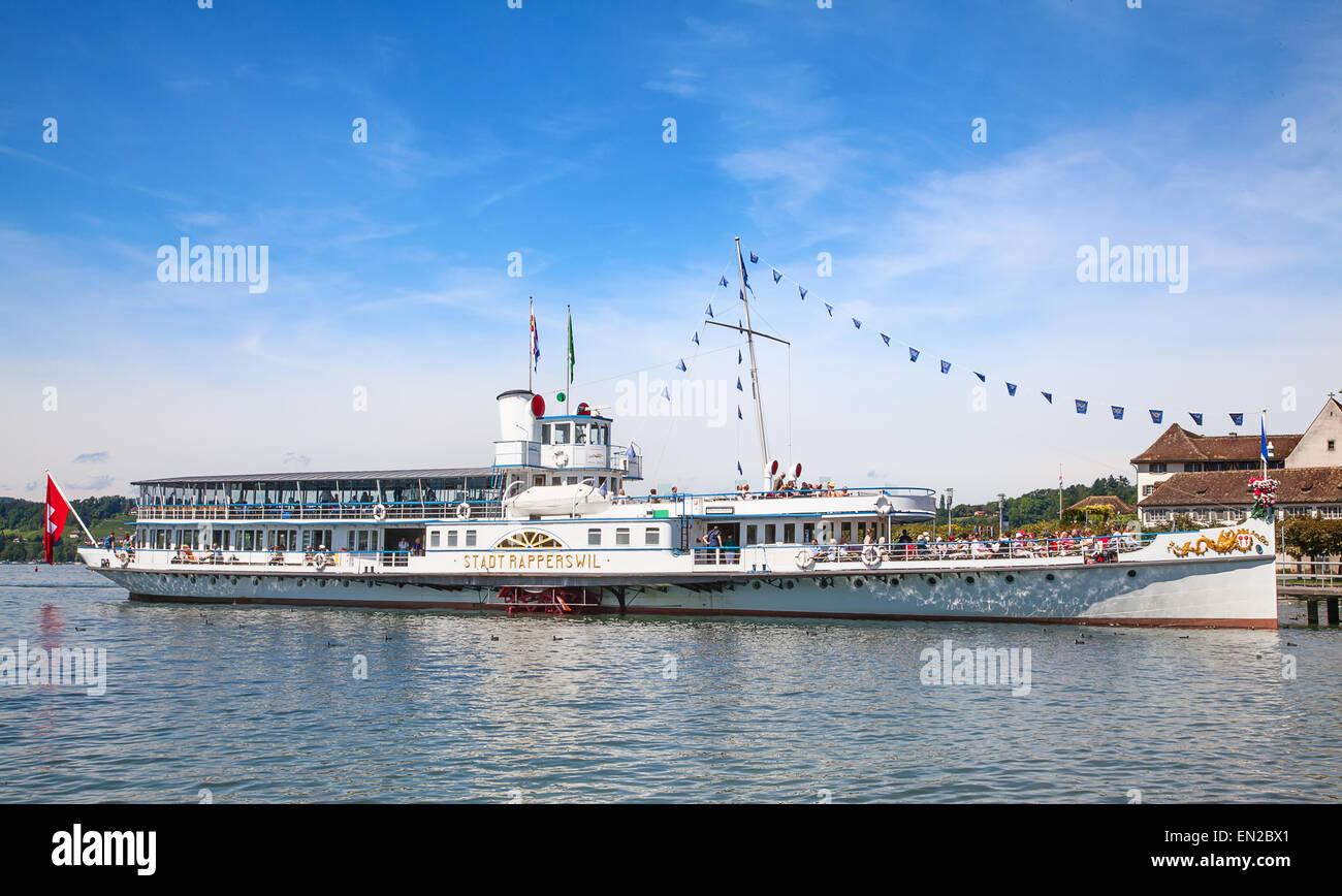 RAPPERSWIL, SWITZERLAND - AUGUST 17, 2014: Historical steam boat "Stadt Rapperswil" preparing for cruise on lake Zurich.Steamboa Stock Photo