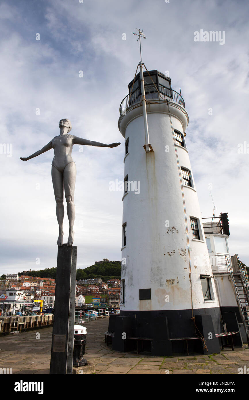 UK, England, Yorkshire, Scarborough, Vincent’s Pier, Diving Belle sculpture by lighthouse Stock Photo