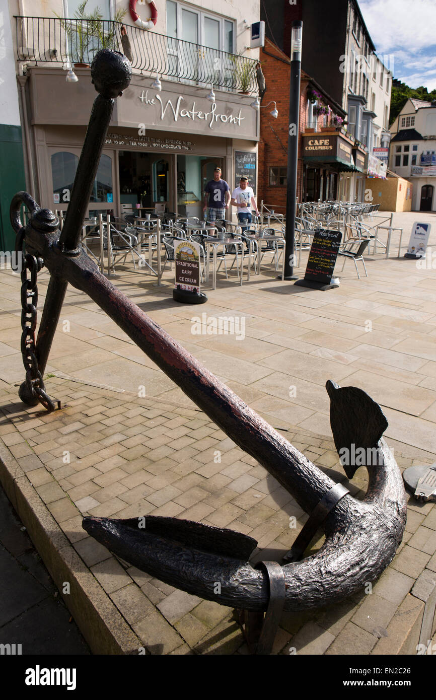 UK, England, Yorkshire, Scarborough, Sandside, large iron ship’s anchor, recovered from sea by sub aqua club outside coffee shop Stock Photo