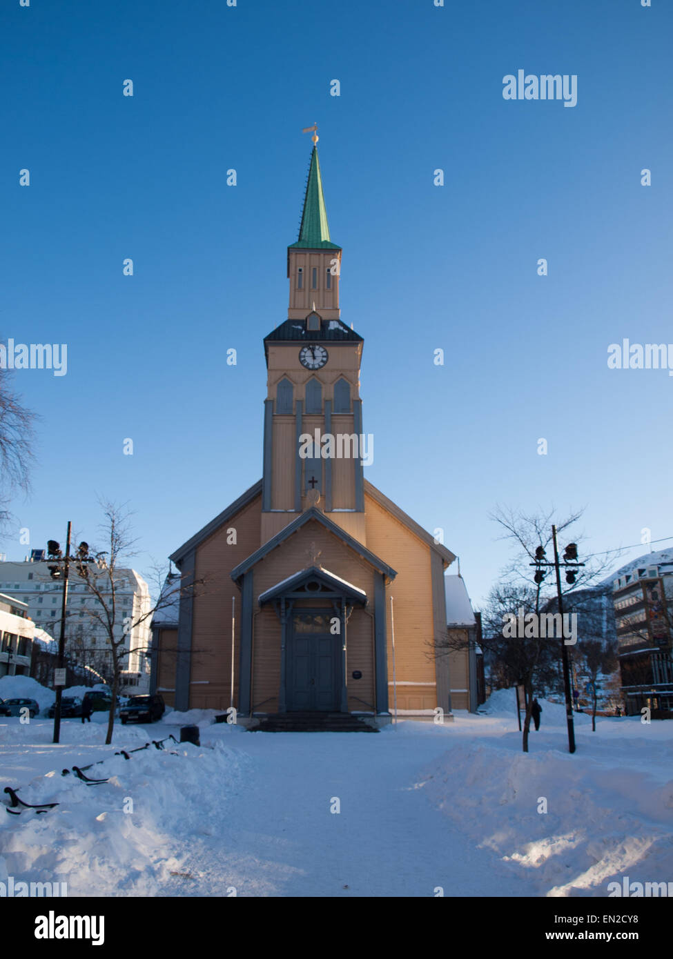 Tromso Old Cathedral in Winter with its front covered with white snow. Stock Photo
