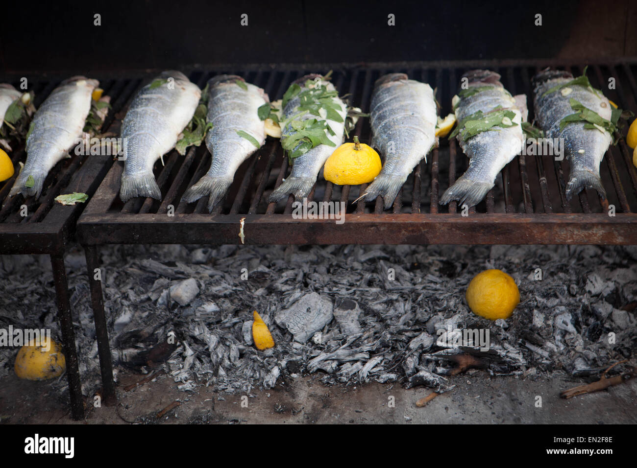 Mediterranean fish cooking Stock Photo - Alamy