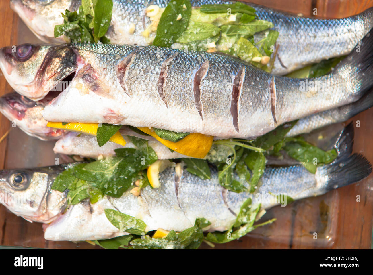 prepared sea bass fish for cooking Stock Photo Alamy