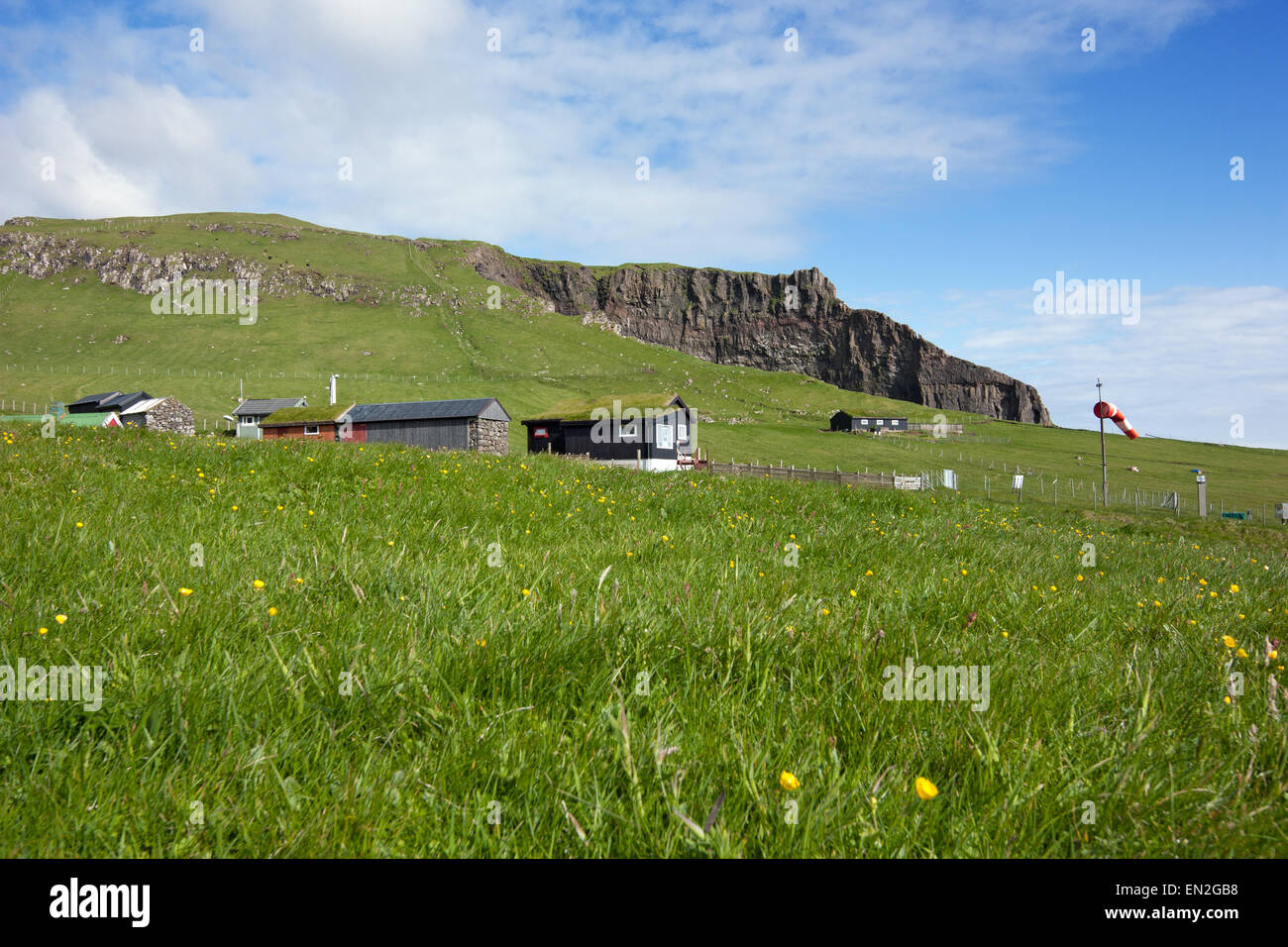 Mykines, Faroe Islands : scattered houses in a green field Stock Photo