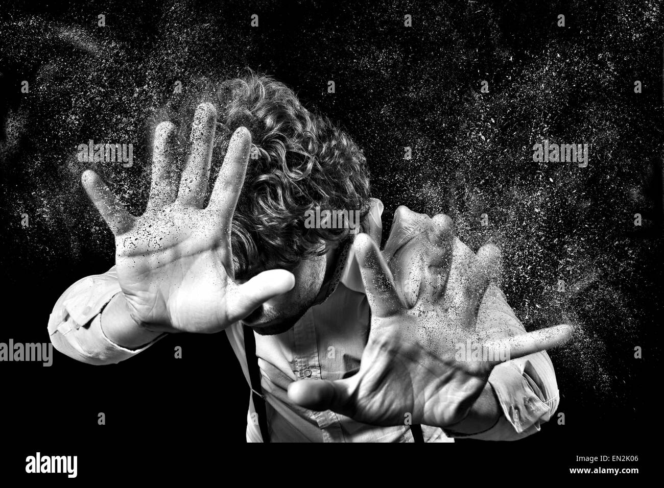 image of a man who performs magic with his hands Stock Photo