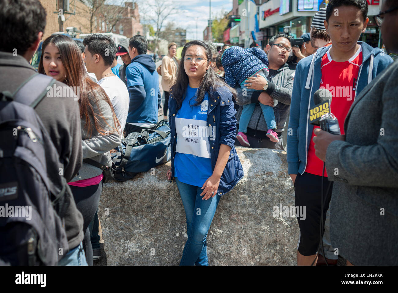 Jackson Heights, New York, USA. 26th Apr, 2015. Members of the Nepalese