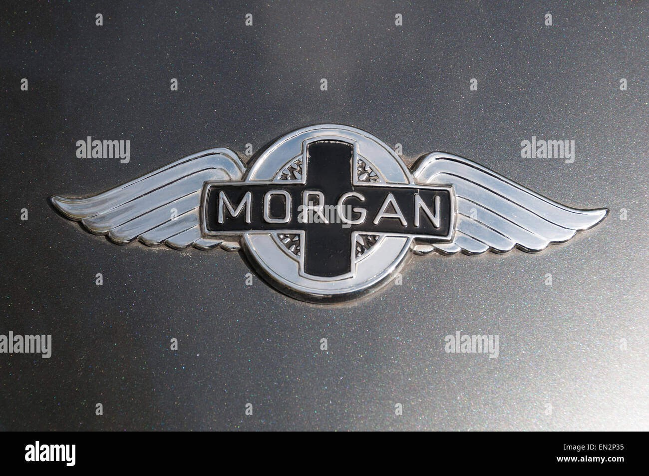 Morgan car emblem on shiny black background Stock Photo