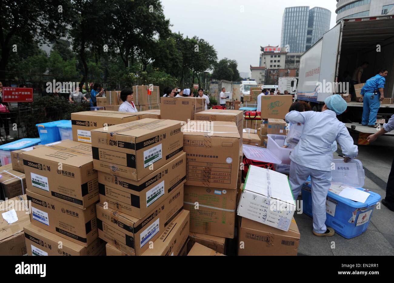 Chengdu. 26th Apr, 2015. People load medical supplies in Chengdu, southwest China's Sichuan Province, April 26, 2015. A medical team departed from Chengdu to Nepal to help with relief work on early Monday morning. Credit:  Xinhua/Alamy Live News Stock Photo