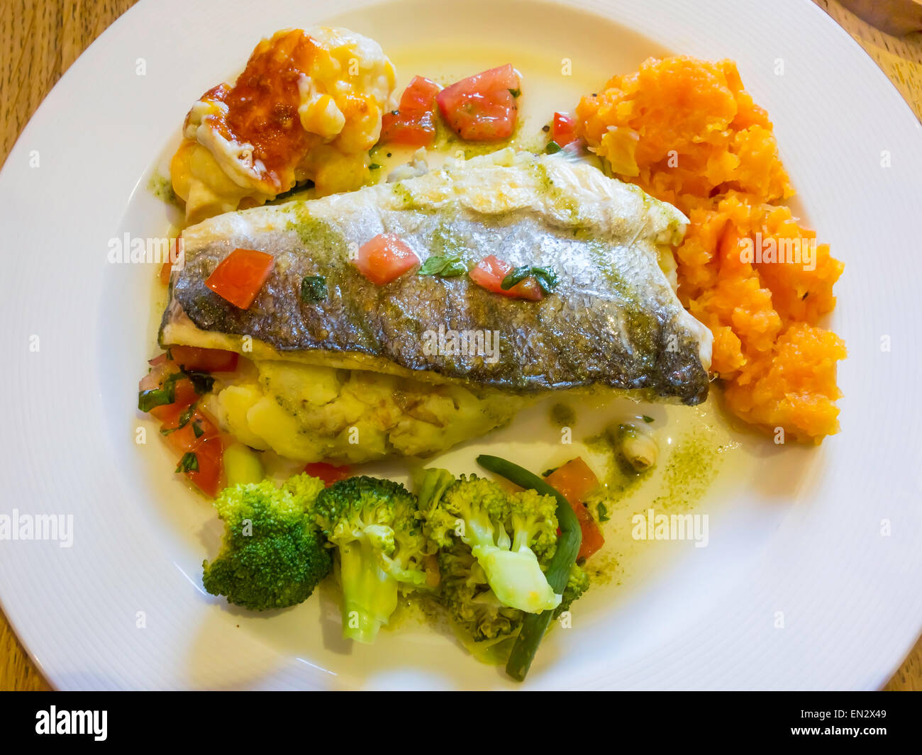 Lunch, a tasty meal of grilled Sea Bass on a bed of mashed potato with