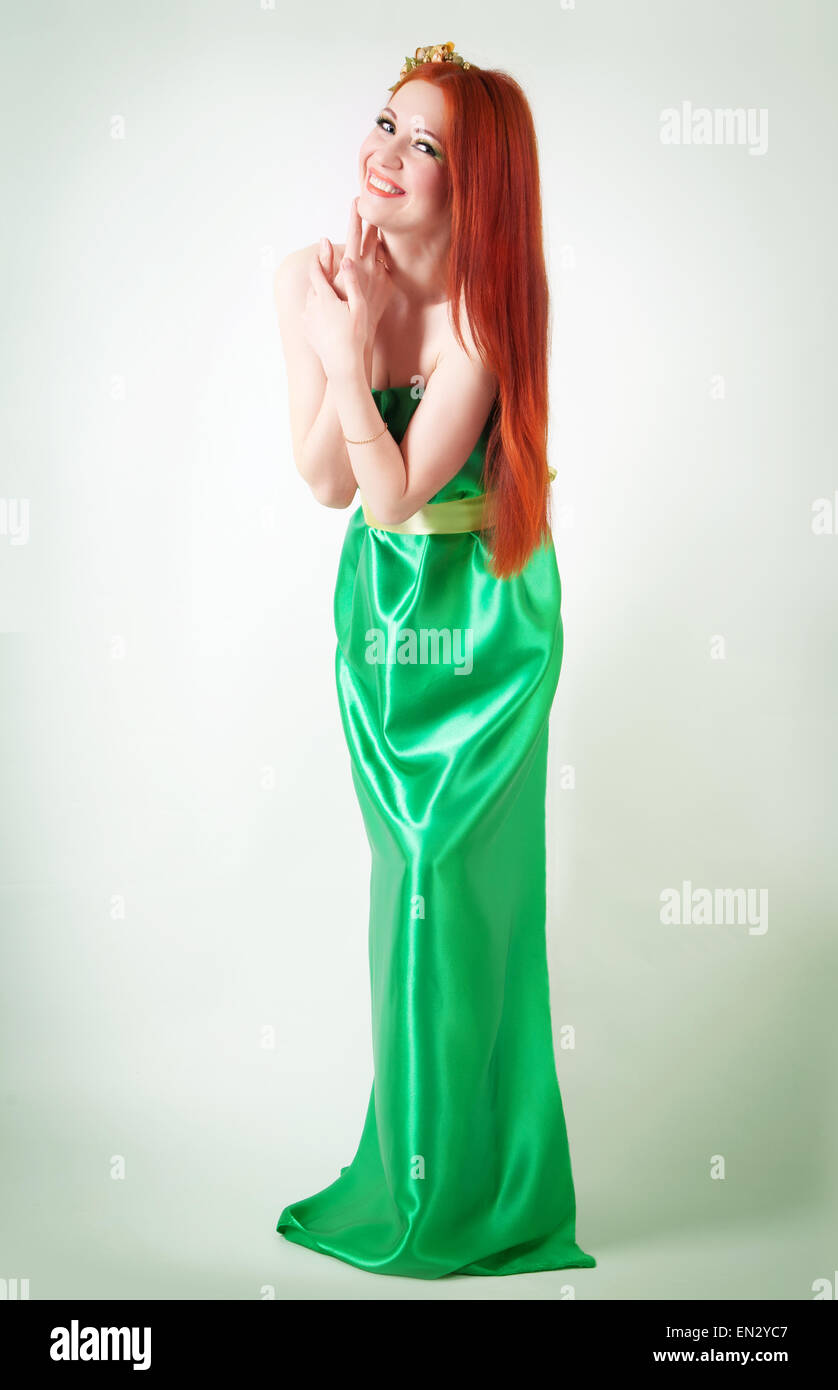 Portrait of beautiful red-haired girl with flowers in hair Stock Photo ...