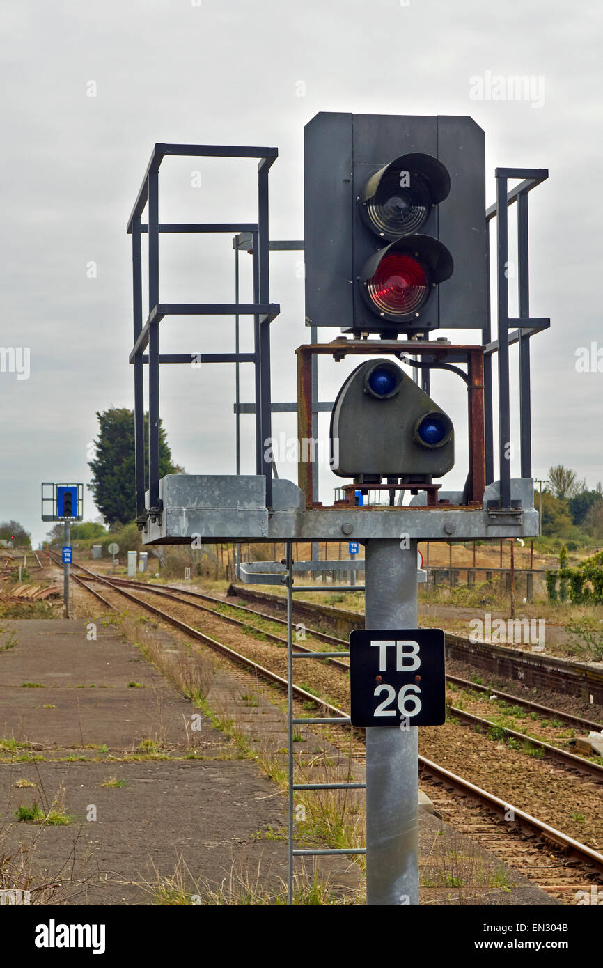 Double aspect railway colour light signal with additional position indicator lights to signal a train into sidings. Stock Photo