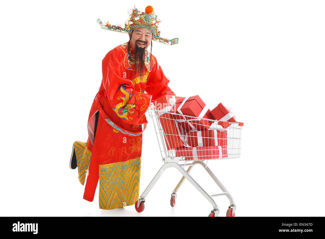 The God of wealth is pushing a shopping cart Stock Photo