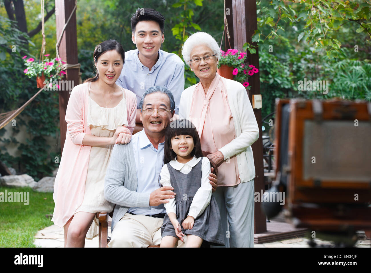 Happy family in outdoor photography Stock Photo