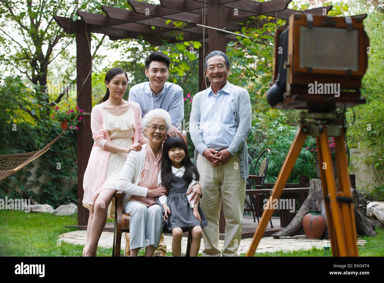Happy family in outdoor photography Stock Photo
