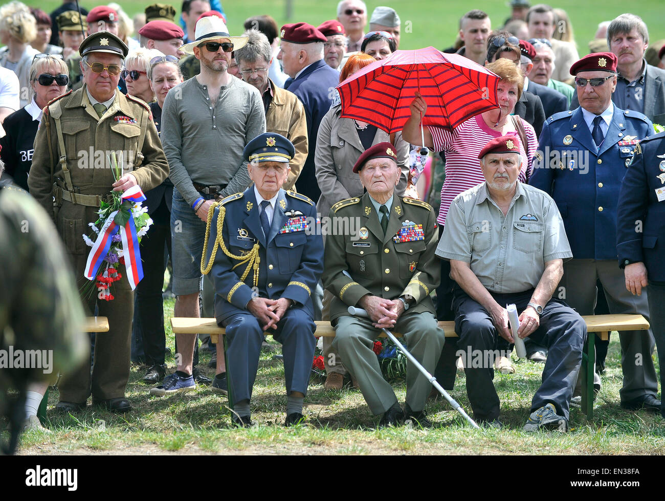 Orechov, Czech Republic. 25th Apr, 2015. About thousand people meet to commemorate wartime pilot Adolf Opalka on the occasion of his 100th birth anniversary and 73th anniversary of his parachute group Out Distance's operation participating in attack on Deputy Reichsprotektor Reinhard Heydrich and at the same time 70th anniversary of end of World War II, at the memorial in Orechov, Czech Republic, April 25, 2015. In the picture sits Emil Bocek (left) one of the last living pilots of British Royal Air Force (RAF) and Jaroslav Klemes (center) the last living parachutist landed in protectorate. (C Stock Photo