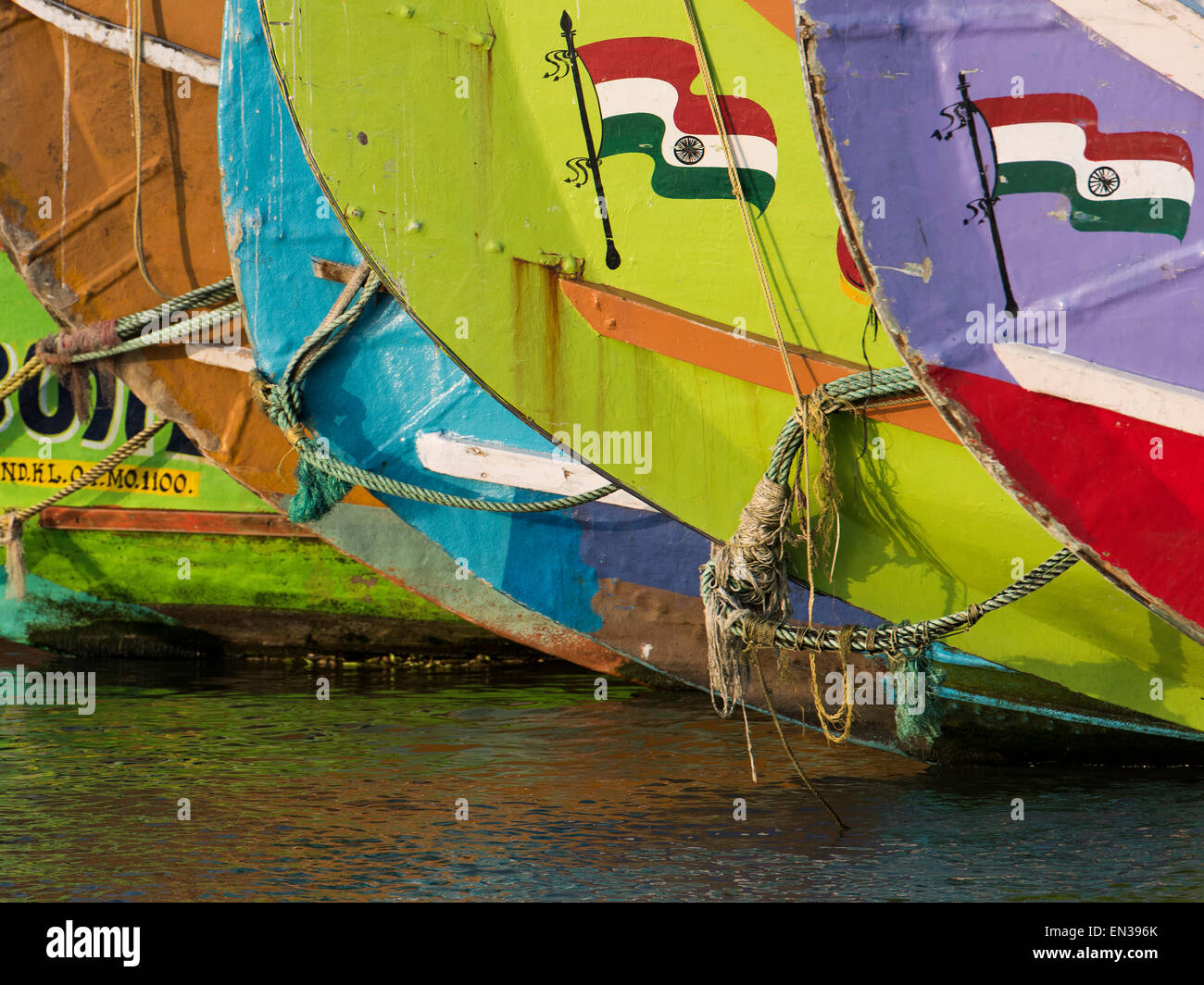 Fishing boats with Indian flag, Gundu Island, Kerala, India Stock Photo