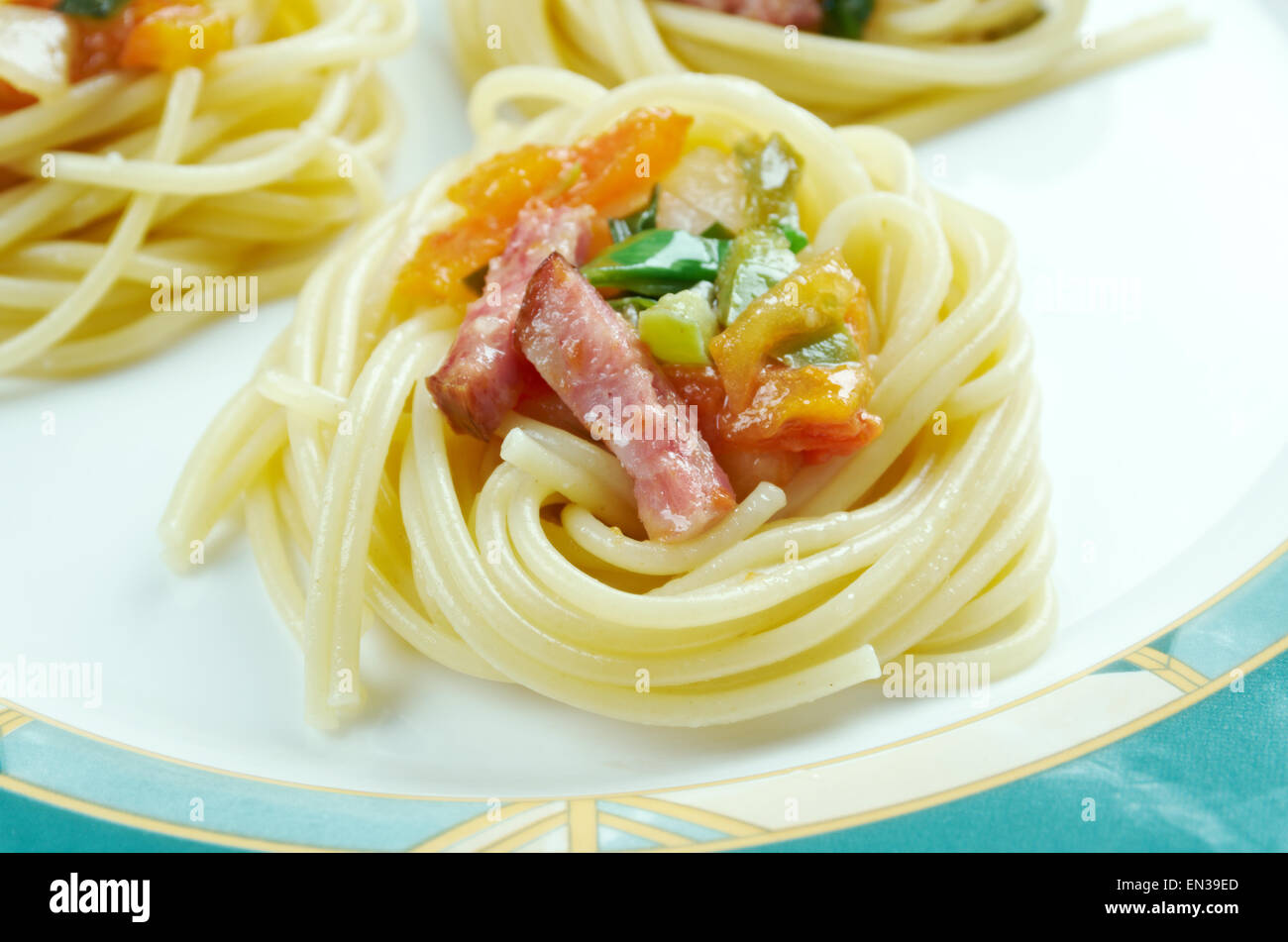 spiral squash spaghetti noodles with sausage and vegetable sauce Stock