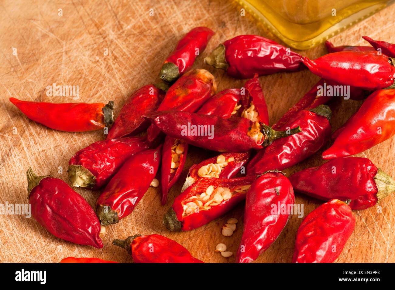 red hot chili peppers and olive oil Stock Photo Alamy
