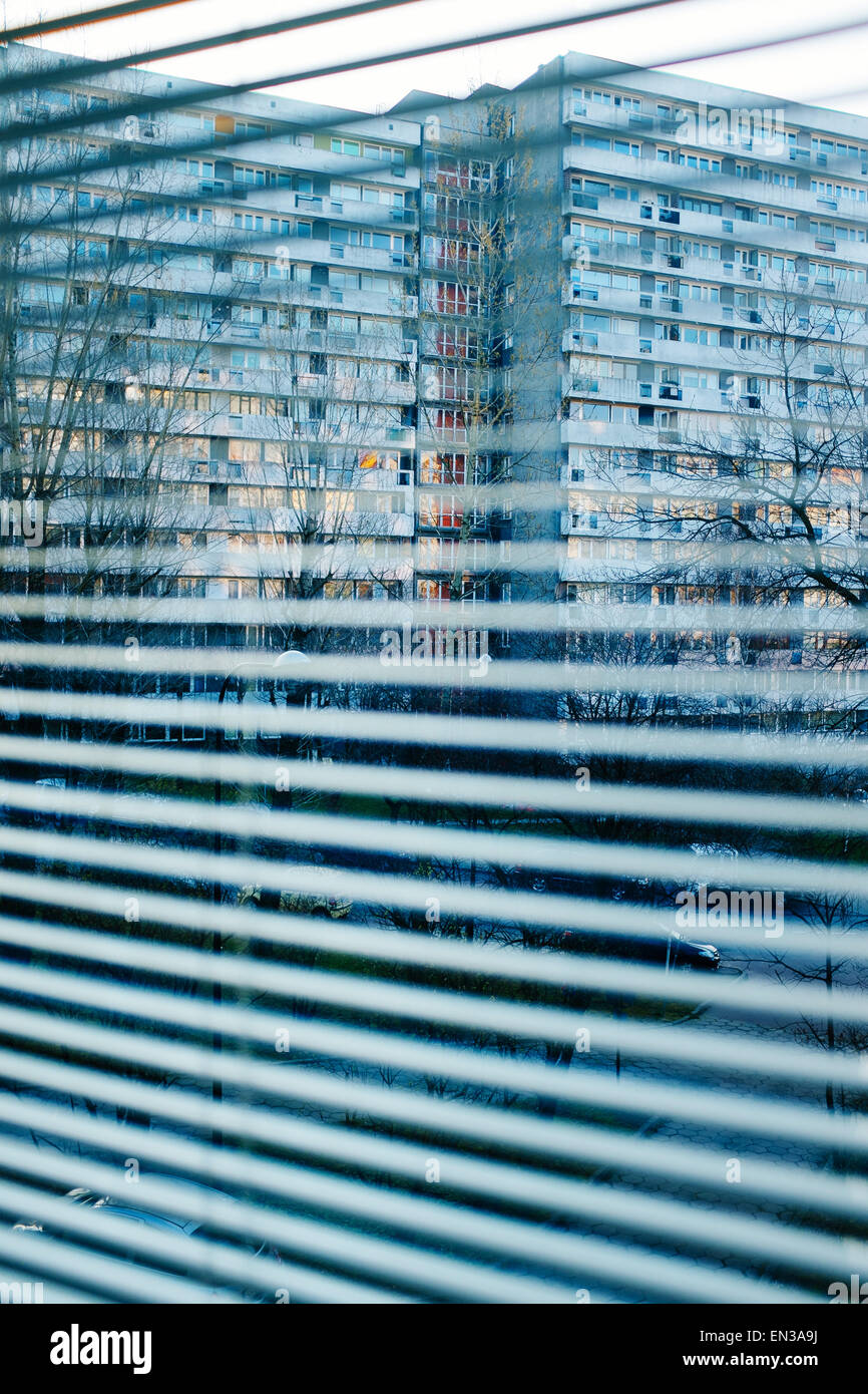 Housing blocks seen from behind venetian blinds, Katowice , Poland Stock Photo