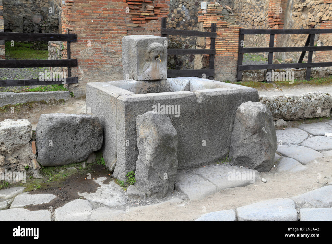 Public drinking water fountain on Via Stabiana, Pompeii, Italy Stock