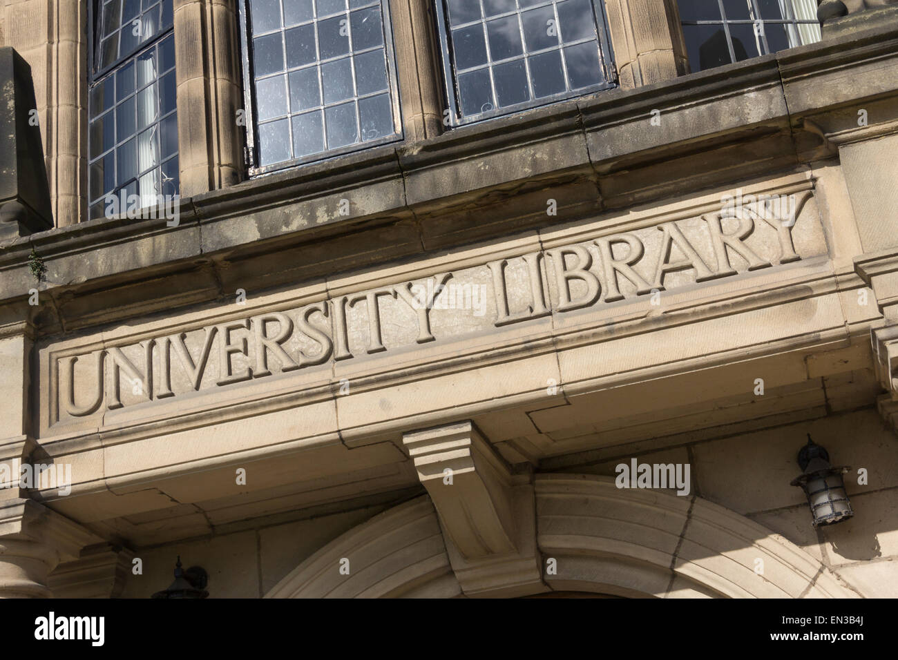 Stone masonry sign over the entrance to the 1858 Durham University library building on Palace Green, Durham. Stock Photo