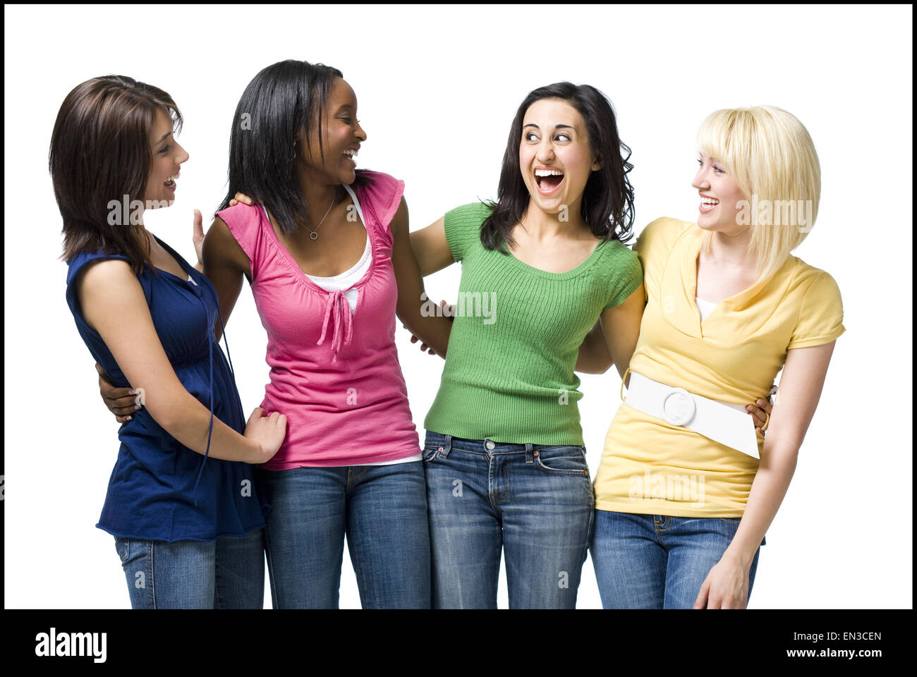 Four women hugging and smiling Stock Photo - Alamy