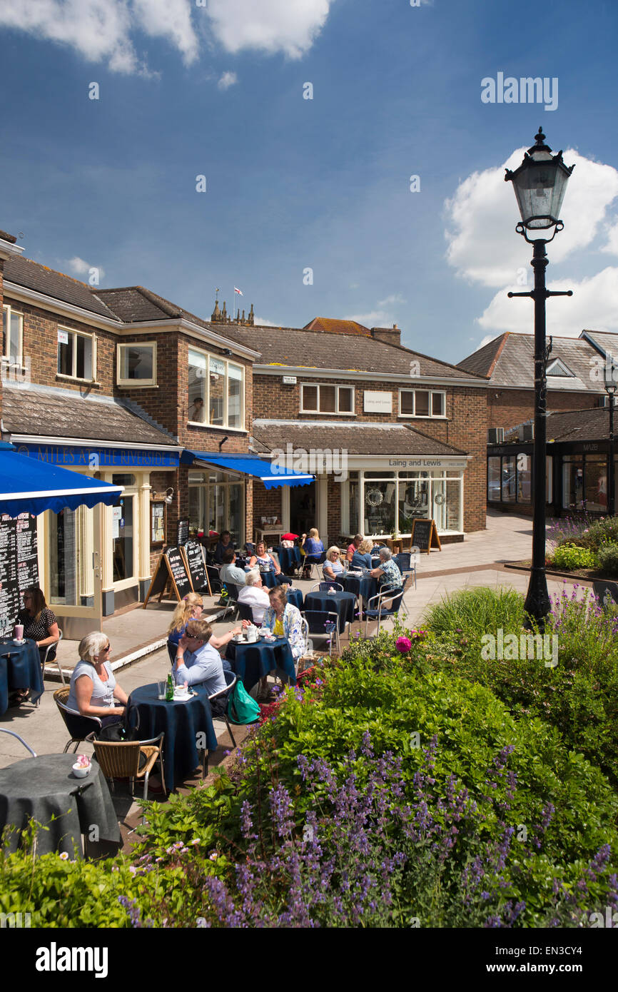 UK, England, Somerset, Taunton, Riverside Place, al fresco diners at riverside café in sunshine Stock Photo