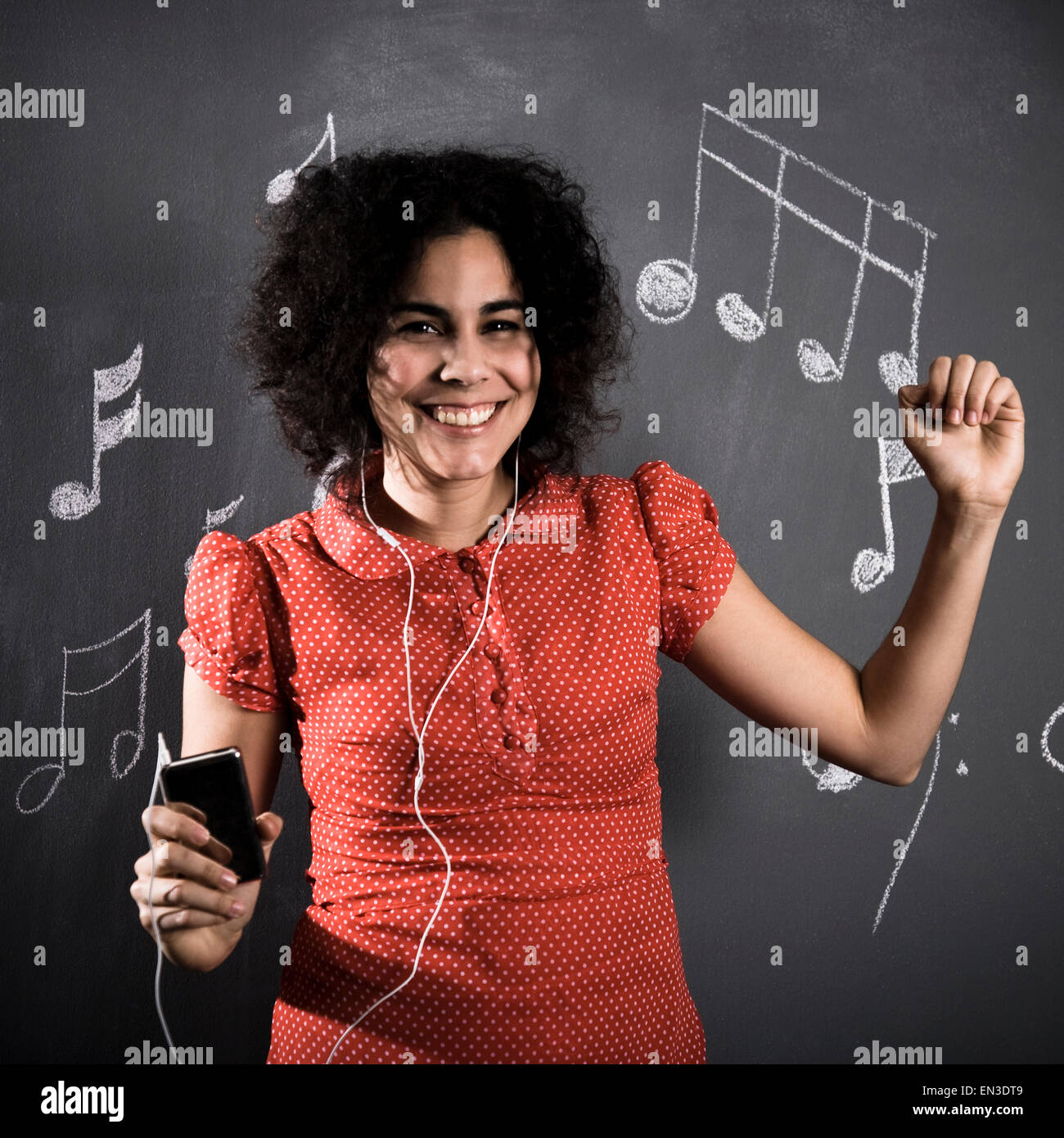 woman listening to mp3 player Stock Photo