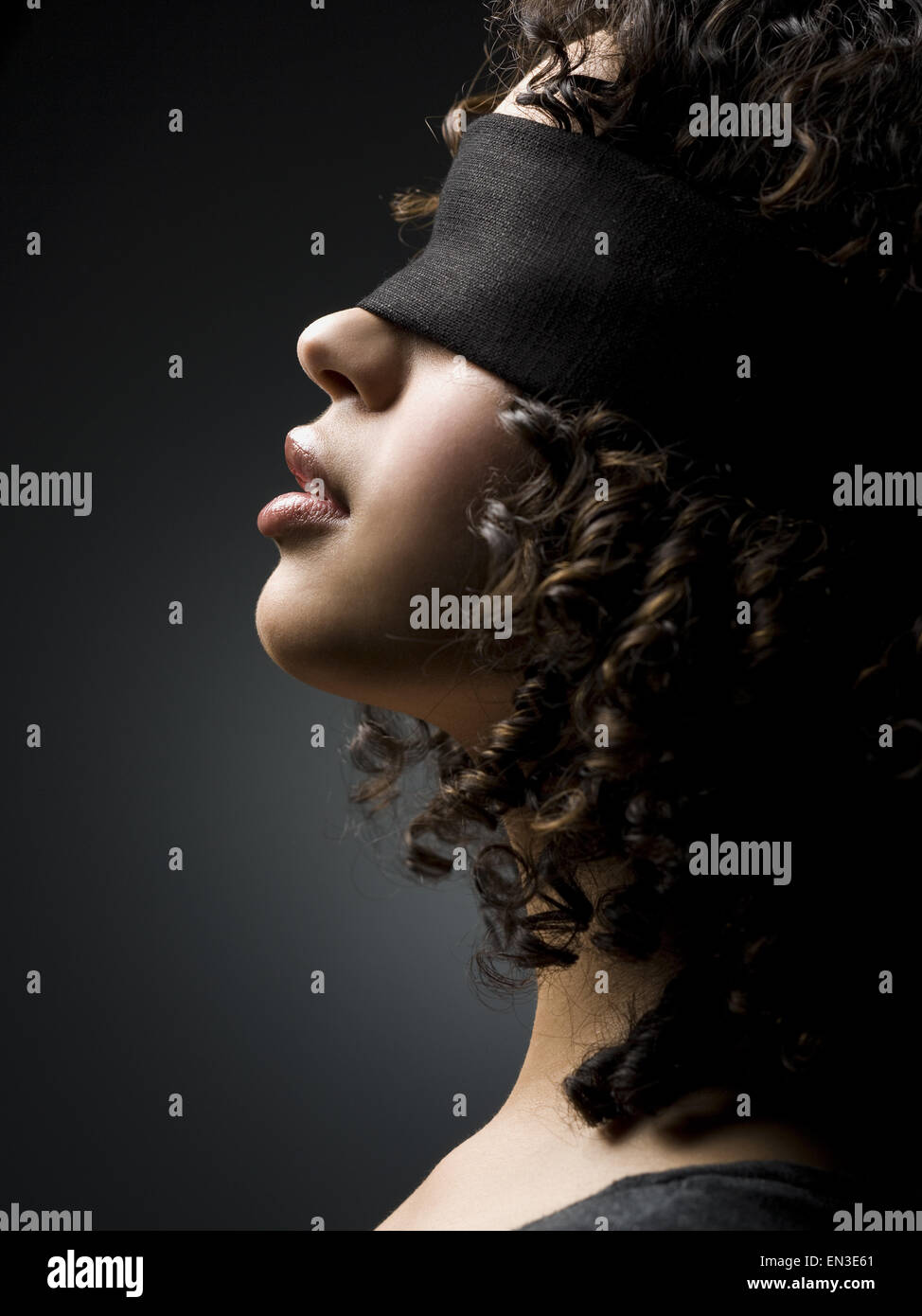 Blindfolded woman hi-res stock photography and images - Alamy