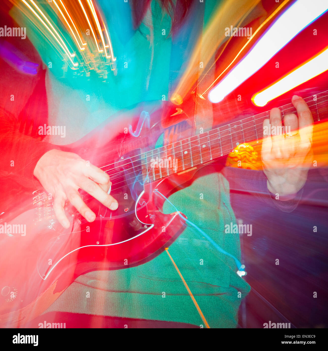 Young man playing electric guitar Stock Photo Alamy