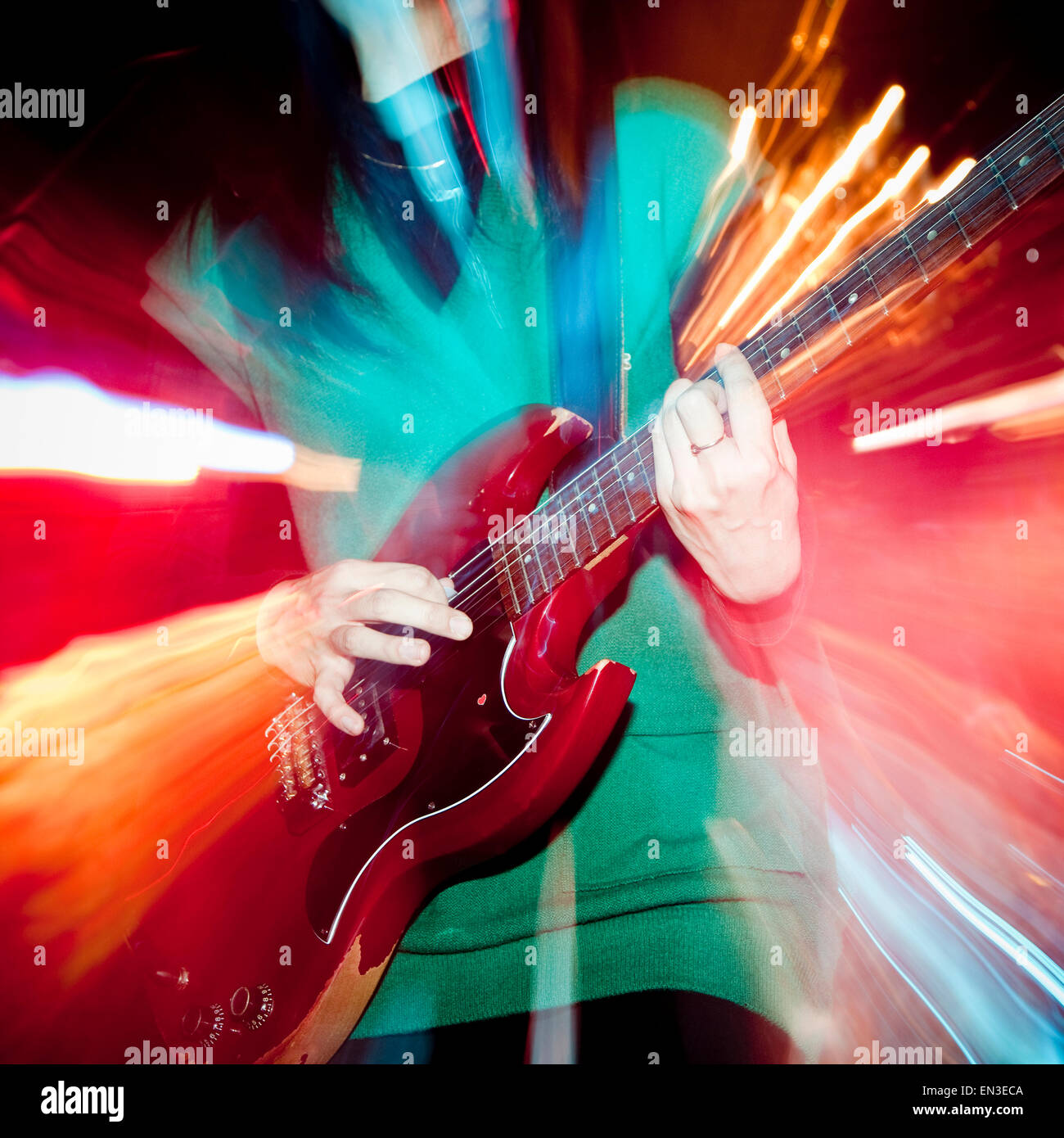 Young man playing electric guitar Stock Photo Alamy