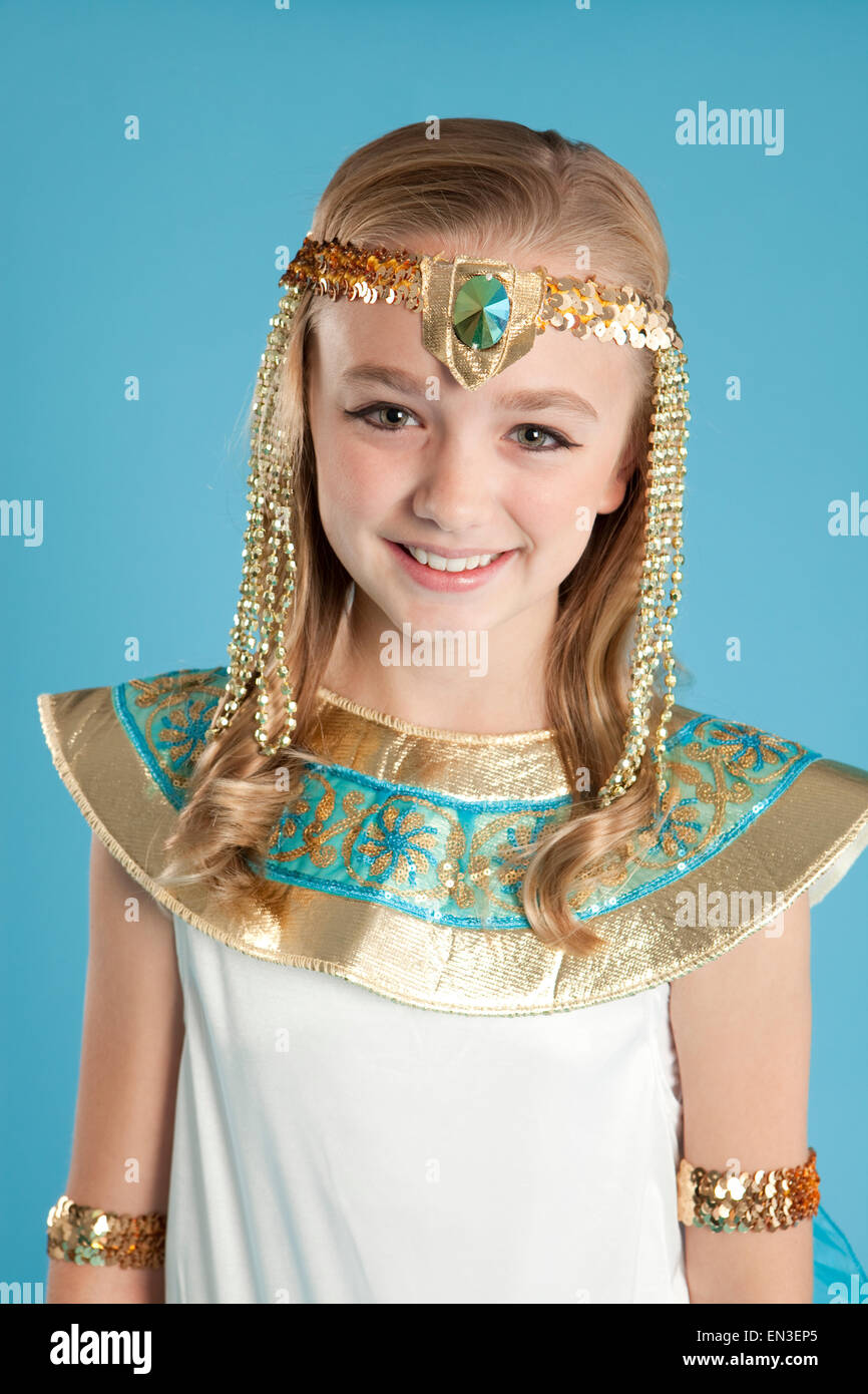 Portrait of girl (10-11) in Cleopatra costume for Halloween Stock Photo