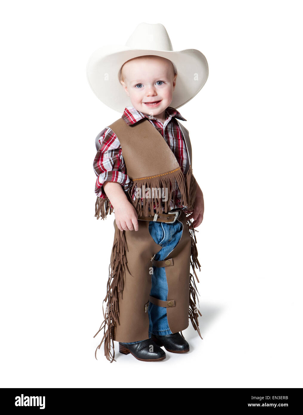 Portrait of boy (12-17 months) in cowboy costume for Halloween Stock Photo
