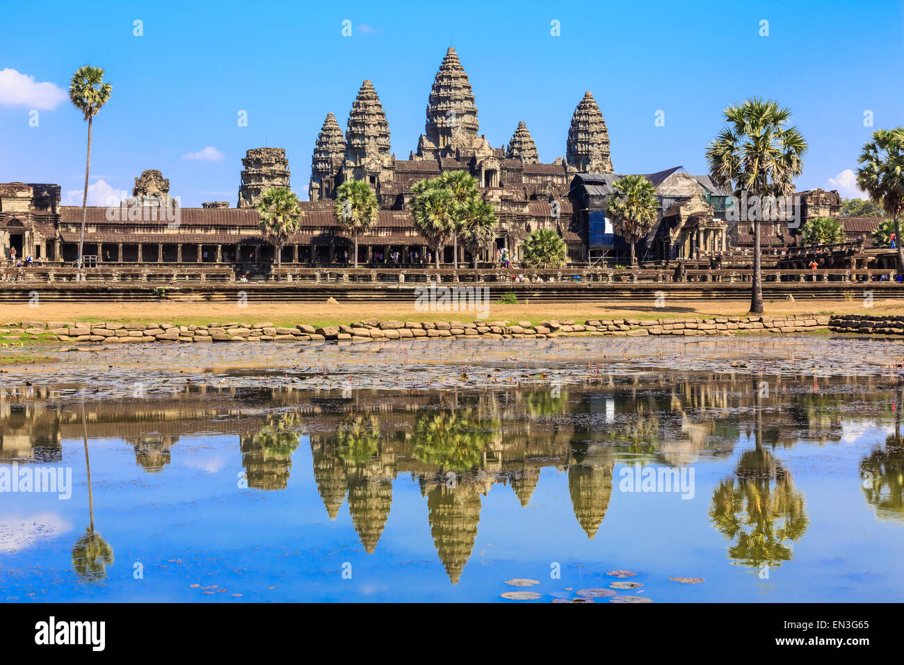 Ancient temple Angkor Wat from across the lake. The largest religious monument in the world. Siem Reap, Cambodia Stock Photo
