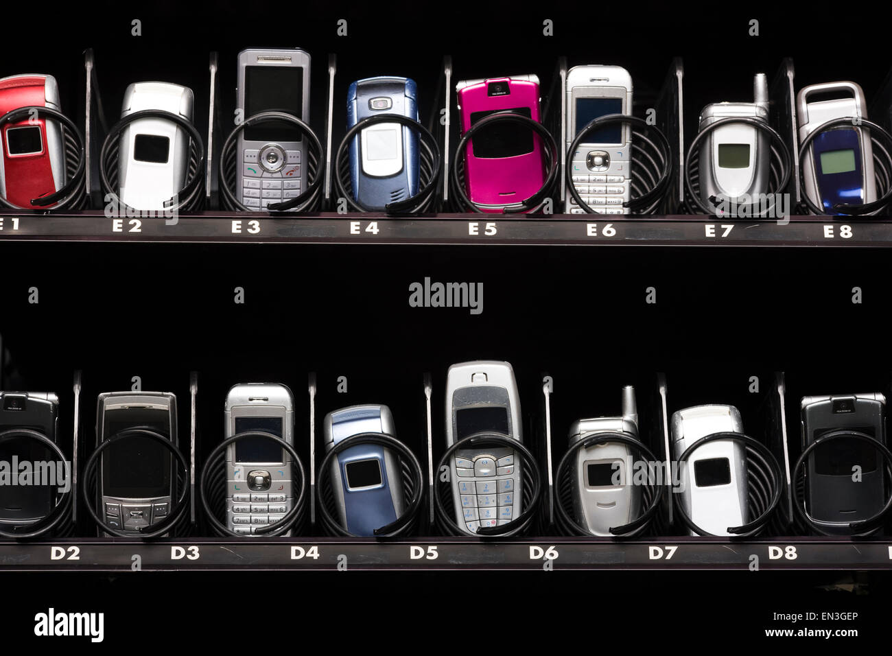 cell phones in a vending machine Stock Photo