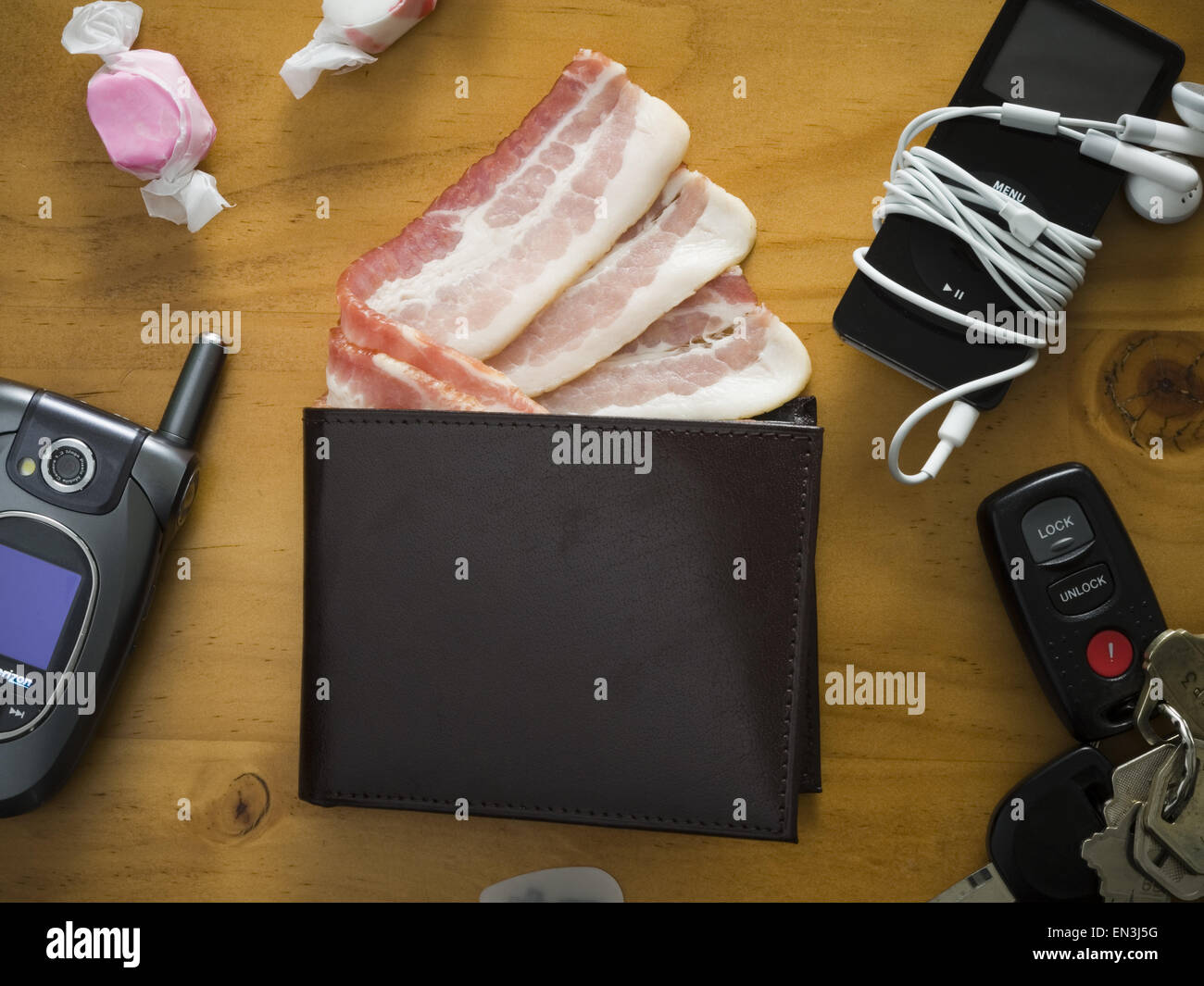 Billfold with strips of bacon Stock Photo