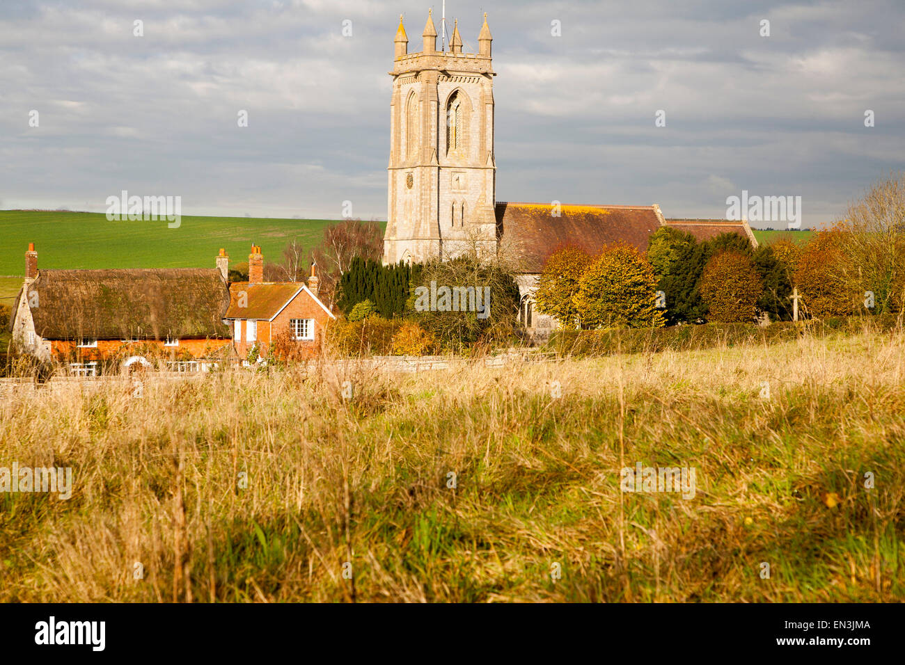 Parish church St Michael and All Angels village of West Overton in Wiltshire, England, UK in the River Kennet valley Stock Photo