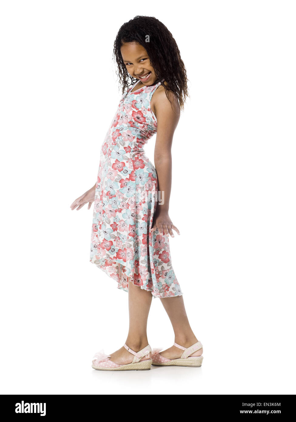 girl in a floral print dress Stock Photo