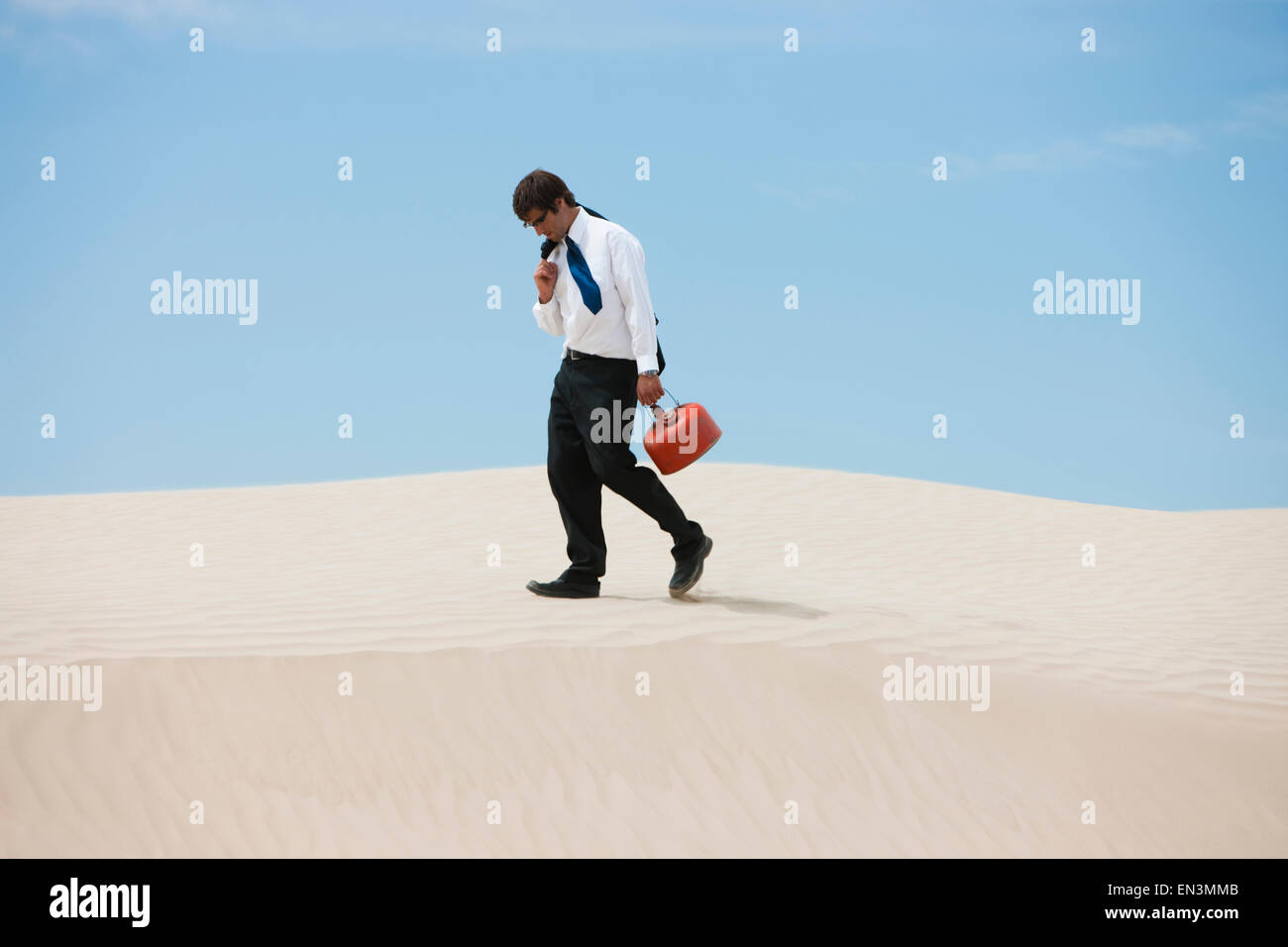 Little Sahara,Utah,USA,Lonely businessman on desert Stock Photo