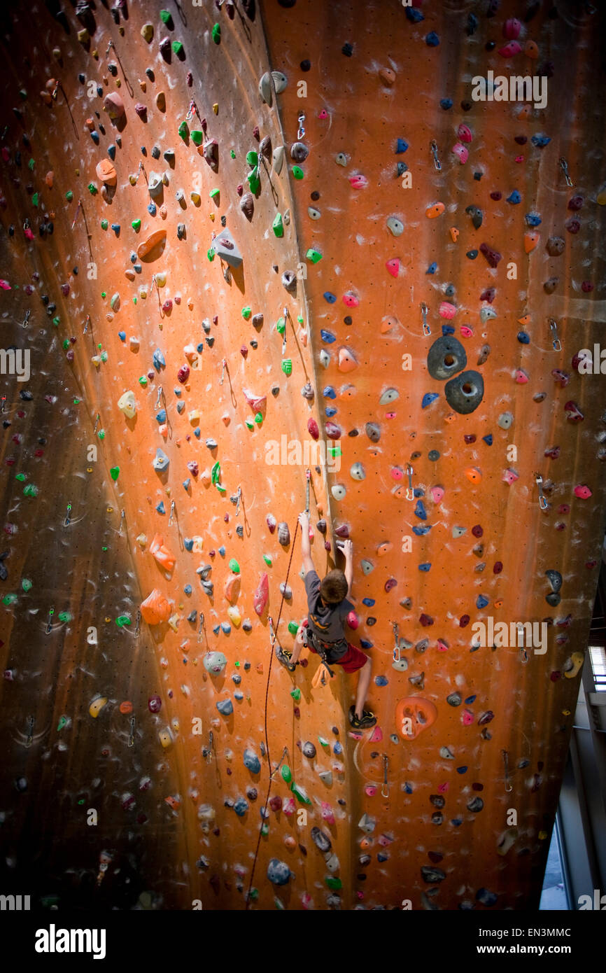 Sandy,Utah,USA,Boy (12-13) on climbing wall Stock Photo