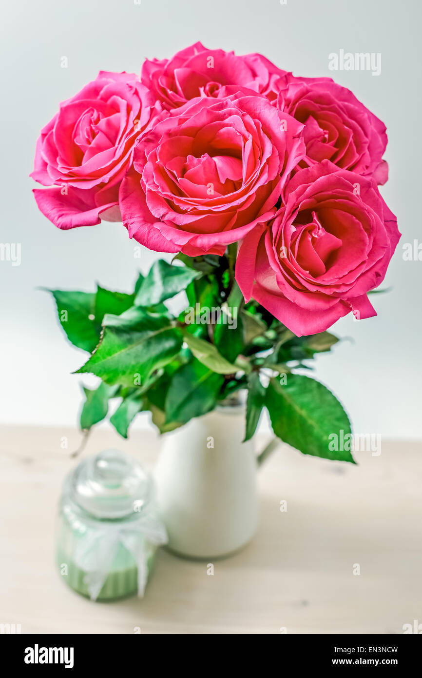Bouquet of pink roses on white background Stock Photo - Alamy