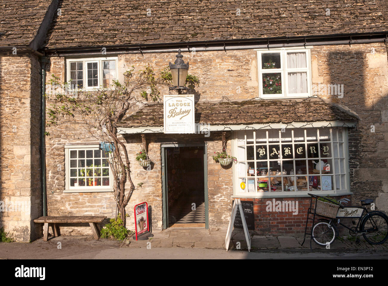Traditional old fashioned exterior of village bakery shop at Lacock, Wiltshire, England, UK Stock Photo