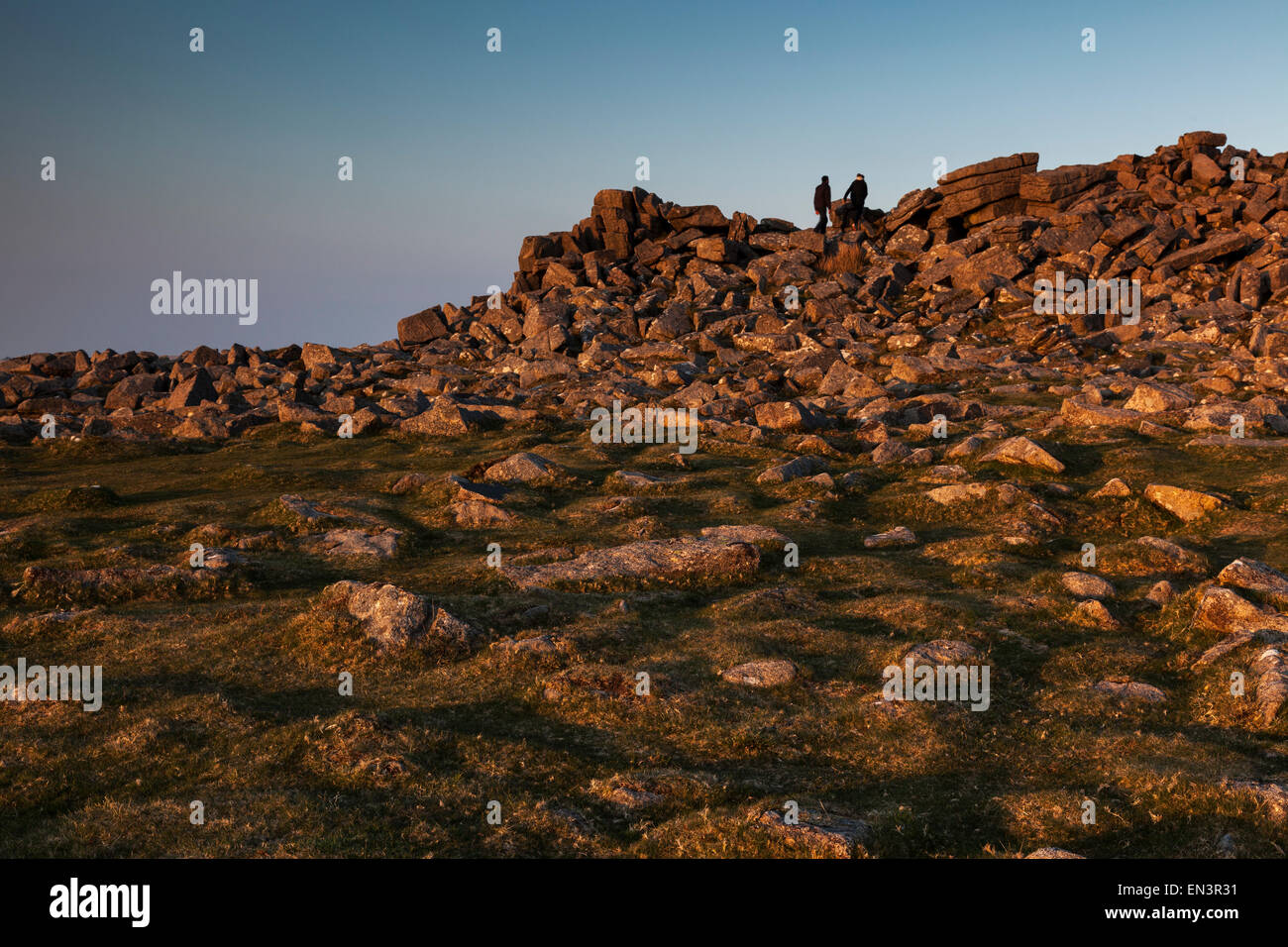 Two People Climbing to the top of Sharpitor Stock Photo