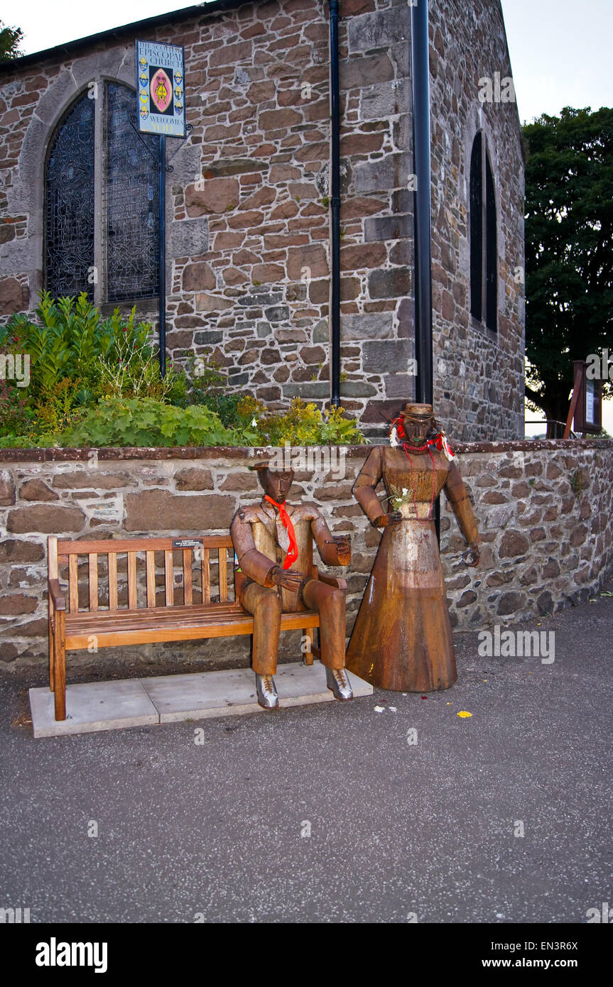 Street art, male and female tinplate metal android robots, St. Cuthbert