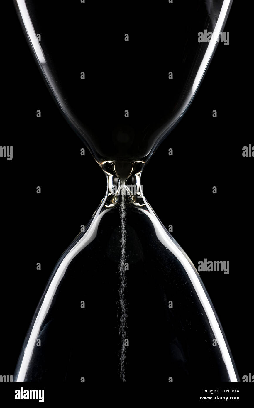 Studio shot of hourglass on black background Stock Photo