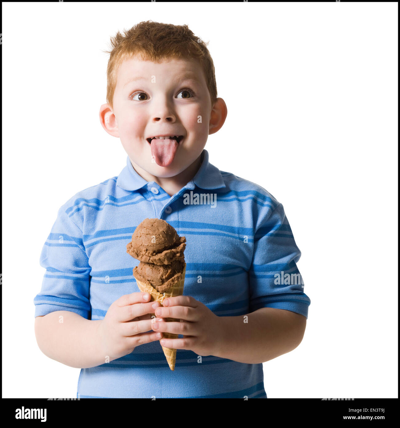 boy holding an ice cream cone Stock Photo Alamy