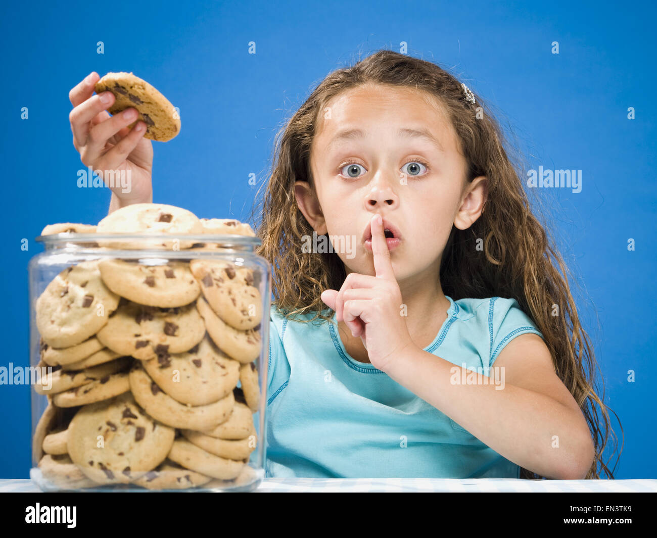Child sneaking food hires stock photography and images Alamy