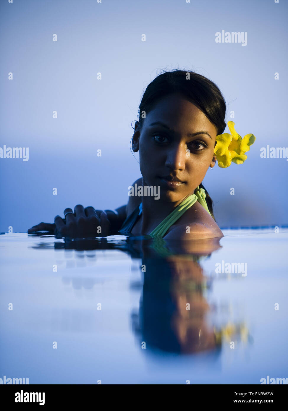 Portrait of a young woman in a swimming pool Stock Photo