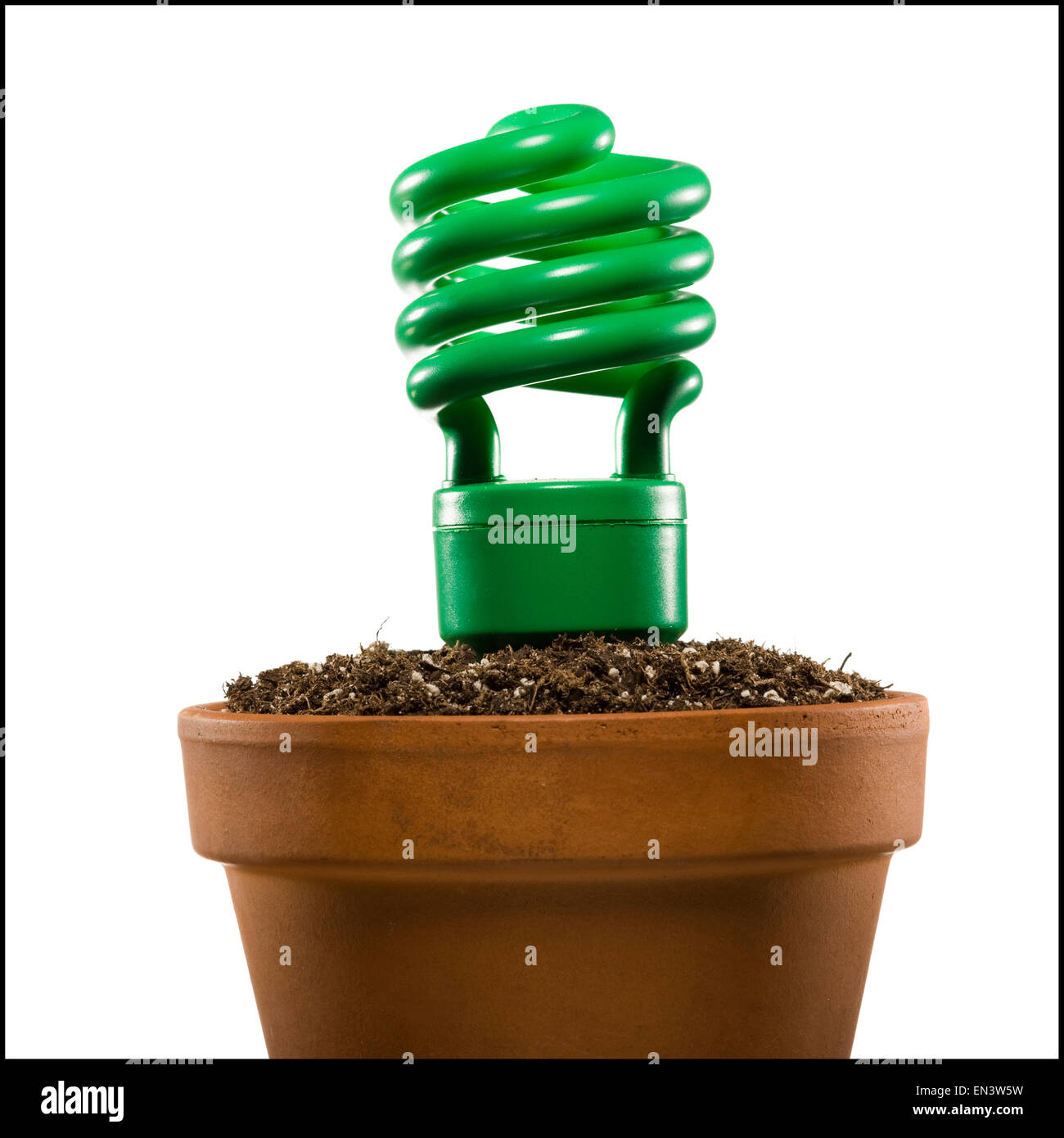 light bulb planted in a pot of soil Stock Photo Alamy