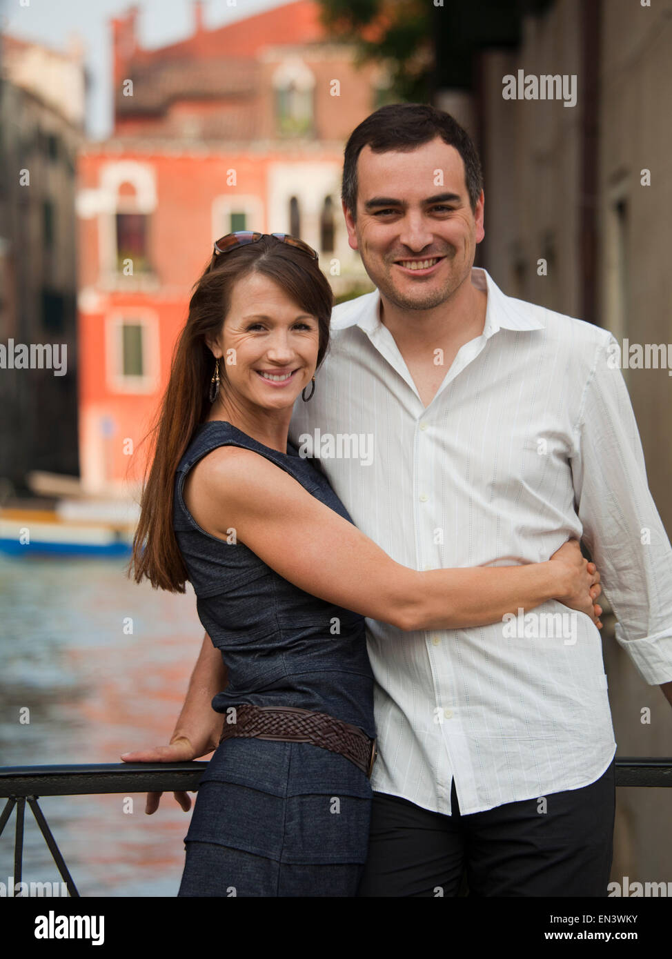 Italy, Venice, Mature couple posing on bridge Stock Photo Alamy